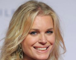 WHAT IS THE ZODIAC SIGN OF REBECCA ROMIJN?